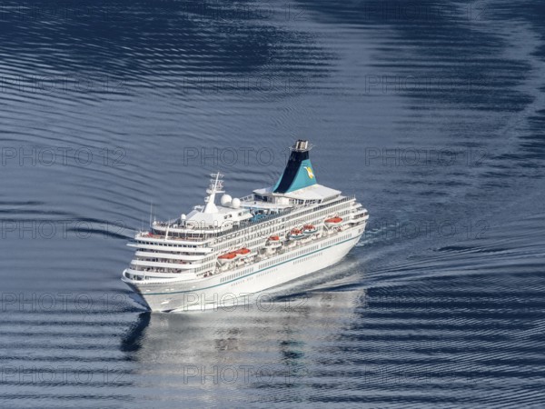 Cruise ship Artania leaving the Geirangerfjord into fjord Synnylvsfjord, seen from viewpoint at road 60 Hellesylt, Stranda, Sunnmøre region, Norway, Europe