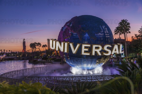 Lighted globe fountain near entrance to Universal Studios theme park in Orlando, Florida, USA, North America