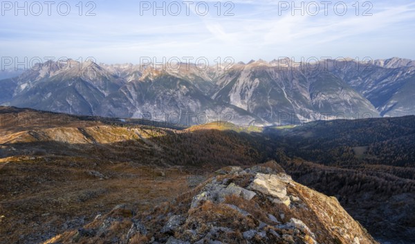 View from the ridge of the Venet to the mountain panorama of the Parzinn Group of the Lechtal Alps, yellow larches in autumn, Venet crossing, Ötztal Alps, Tyrol, Austria, Europe