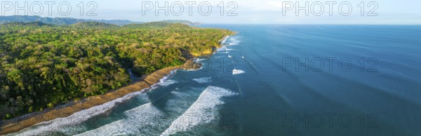 Aerial view, rainforest, sandy beach and coast with waves, Playa Cocalito, Puntarenas, Costa Rica, Central America