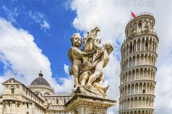 Statue of angels, behind the Leaning Tower and the Cathedral of Santa Maria Assunta, Pisa, Tuscany, Italy, Europe
