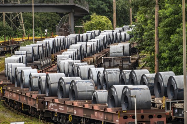 Strip steel coils, on freight wagons, at the ThyssenKrupp Steel plant Schwelgern in Duisburg-Marxloh is part of the Bruckhausen steelworks, North Rhine-Westphalia, Germany, Europe