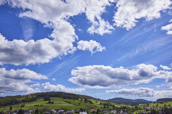 Blue sky with cumulus clouds and hills of the Black Forest with meadows and forest as seen from the district of Gaß, Bernau im Black Forest, Black Forest, Waldshut district, Baden-Württemberg, Germany, Europe