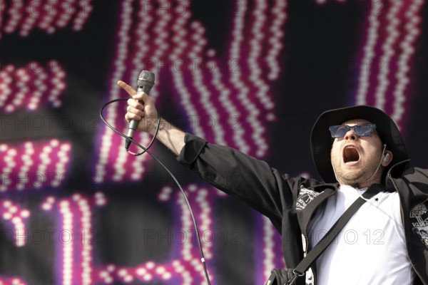 Adenau, Germany, 7 June 2024: Enter Shikari (Roughton Rou Reynolds, singer) play at Rock am Ring. The festival takes place at the Nürburgring race track near the town of Adenau from 7 to 9 June 2024, Europe