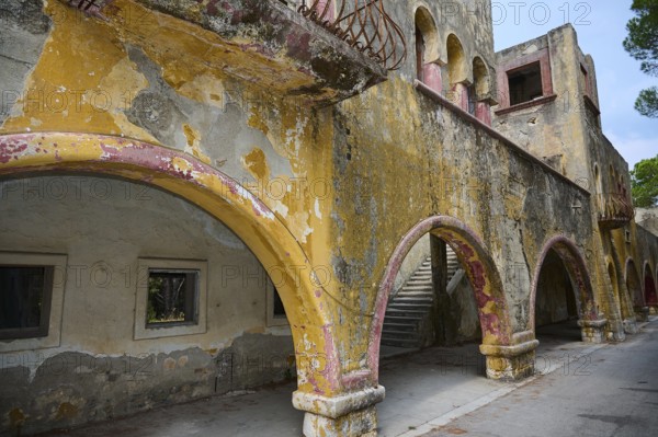 Abandoned architecture with dilapidated arches showing historical traces and long neglect, Italian Governor's Palace, Ruins, Italian colonial settlement, Eleousa, Rhodes, Dodecanese, Greek Islands, Greece, Europe