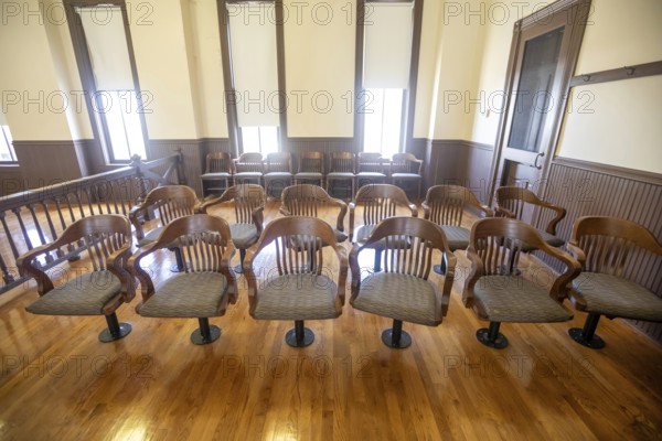 Sumner, Mississippi - The jury's chairs at the Tallahatchie County Courthouse, site of the Emmett Till murder trial. In 1955, 14-year-old Emmett Till was tortured and murdered for allegedly whistling at a white woman. His killers were acquitted by an all-white jury in this courtroom. The courthouse is now part of the Emmett Till and Mamie Till-Mobley National Monument