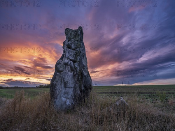 The Stone Maiden at sunset, Dölauer Jungfrau, second largest menhir in Central Europe, Halle (Saale), Saxony-Anhalt, Germany, Europe