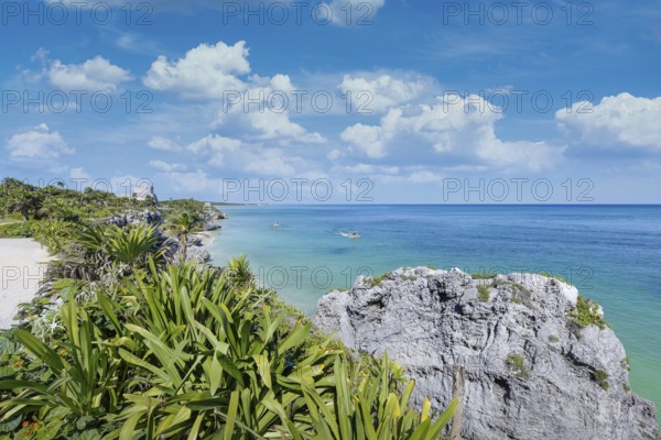 Tulum Archaeological Zone with Mayan pyramids and ruins located on the scenic ocean shore of Quintana Roo province