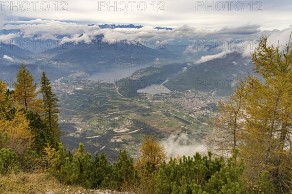 View from the summit of Mount Pizzo di Levico to the lakes in the Sugana Valley, Trentino, Italy, Europe