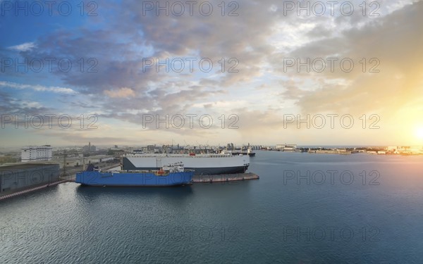 Mexico, Panoramic view of Veracruz city port wharf and cargo ships waiting at the docks. Biggest and most important port in Mexico serving international and domestic routes, Central America