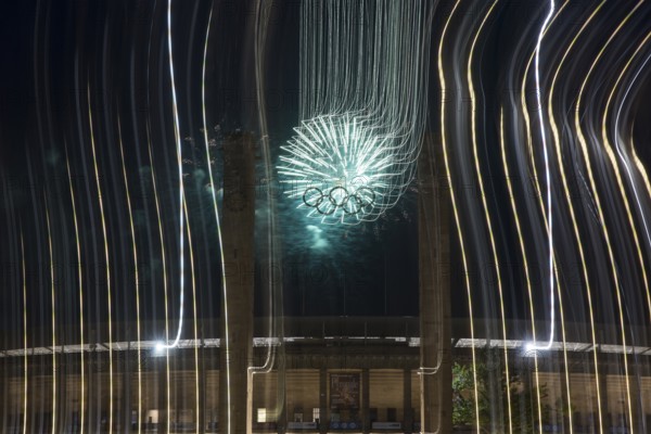 Fireworks behind the Olympic rings at the Pyronale on the Maifeld at the Olympic Stadium, Berlin, 30/08/2024 Note: the photo was taken with a long exposure