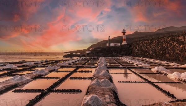 Sunset at the Fuencaliente Lighthouse next to the salt flats, on the route of the volcanoes south of the island of La Palma, Canary Islands, Spain, Europe