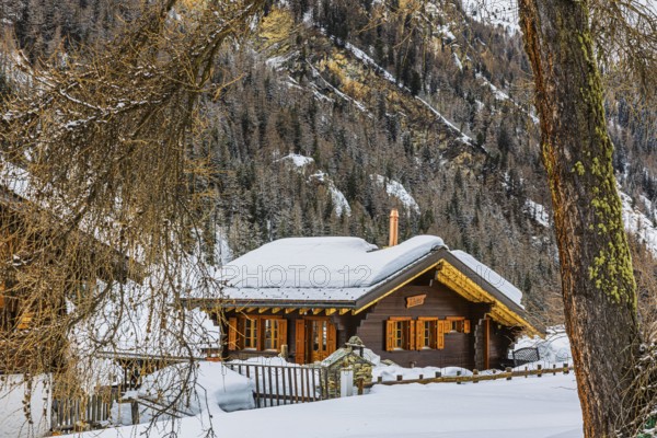Snow-covered wooden chalet, winter landscape, mountain village Zinal, Val d'Anniviers, Valais Alps, Canton Valais, Switzerland, Europe