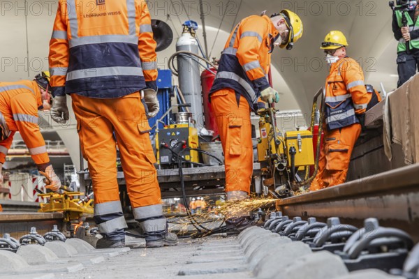 The last rails are being welded at the new main station. All the rails are now in place between Feuerbach and Wendlingen. The last gaps between the rails have been closed using the Thermit welding process. The infrastructure project is scheduled to go online at the end of 2026. Deutsche Bahn estimates the total cost of Stuttgart 21 at around eleven billion euros. Stuttgart, Baden-Württemberg, Germany, Europe