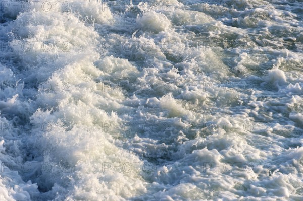 Agitated white foaming water, spray on cascades at the Lech weir, river Lech, background, Landsberg am Lech, Upper Bavaria, Bavaria, Germany, Europe