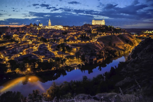 City view of Toledo with the river Tajo, blue hour, province Toledo, region Castilla-La Mancha, Spain, Europe