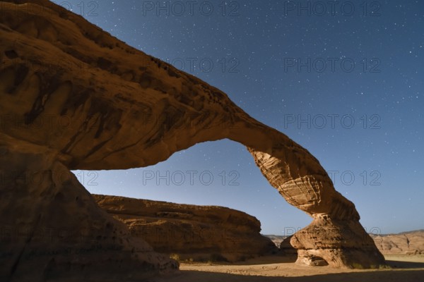 Starry sky above The Arch, also known as Rainbow Rock, near AlUla, Medina Province, Saudi Arabia, Arabian Peninsula, Asia