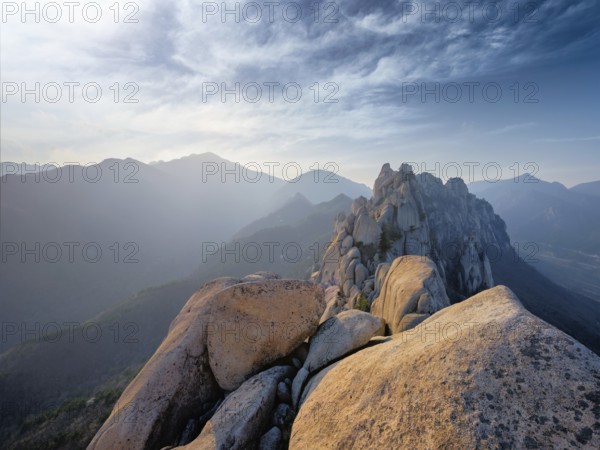 View of stones and rock formations from Ulsanbawi rock peak on sunset. Seoraksan National Park, South Corea