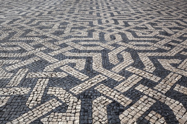 Portuguese mosaic paving, black and white paving motif, Praça dos Restauradores, Lisbon, Portugal, Europe