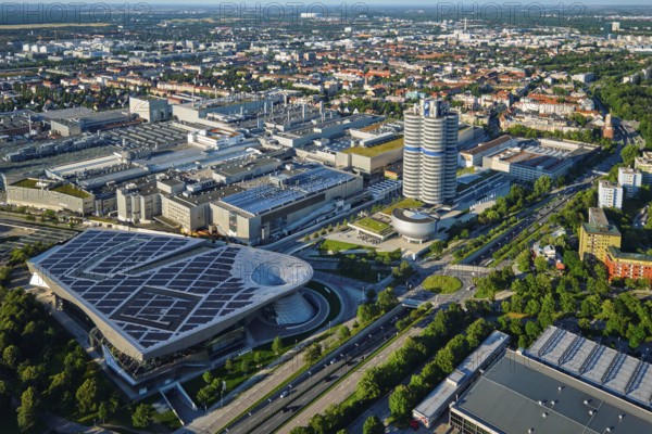 MUNICH, GERMANY, JULY 08, 2018: Aerial view of BMW Museum and BWM Welt and factory and Munich from Olympic Tower. BMW is a famous German luxury car automaker