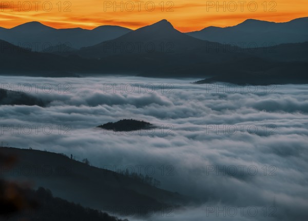 About to rise in the sun Dawn cloudy one morning in the valley of Lesaka, Navarra. Basque Country