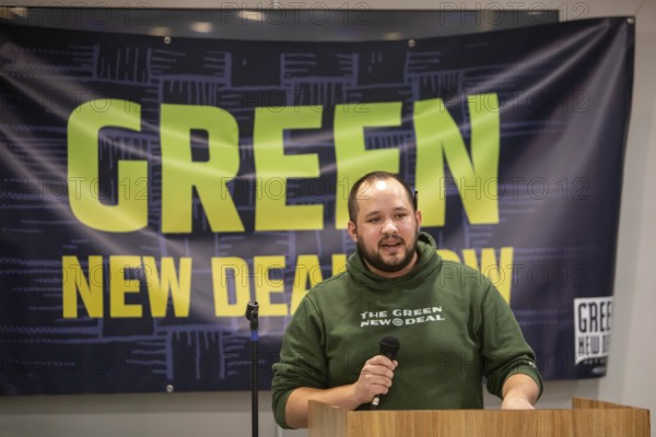 Dearborn, Michigan, Michigan State Representative Dylan Wygela speaks at a rally calling for a Green New Deal. The plan calls for government to devote more resources to fightiing climate change, while securing affordable and reliable power and an end to pollution in low-income communities. The rally was held at United Auto Workers Local 600