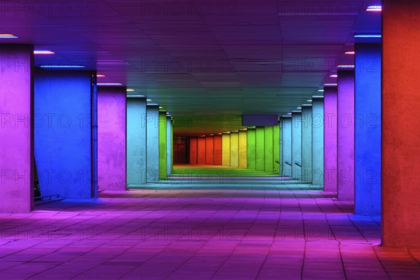Colorful mulitcolord illuminated gallery tunnel rainbow passage under NAI building, Nederlands Architecture Institute near Museum Park, Rotterdam, The Netherlands, Europe