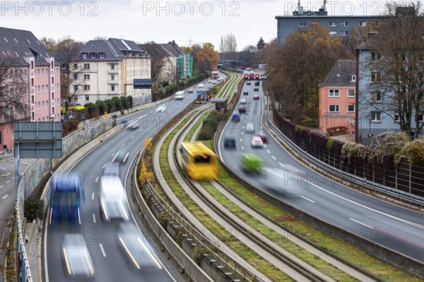 Motorway A40, Ruhrschnellweg, skyline of the city centre of Essen, exit Essen-Huttrop, track bus route, this area would also be affected by a diesel driving ban, Essen, North Rhine-Westphalia, Germany, Europe