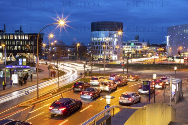 Evening city centre traffic in Essen, large intersection, roundabout, Berliner Platz, this area would also be affected by a diesel driving ban, Essen, North Rhine-Westphalia, Germany, Europe