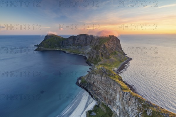 View from Håheia or Håen mountain to mountains and coast, evening mood, Måstad peninsula, Værøy island, Vaeroy, Lofoten, Norway, Europe