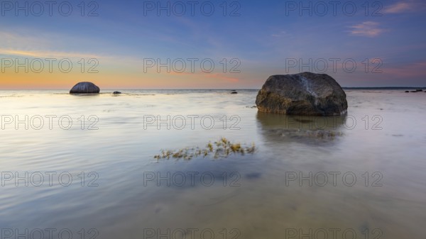 Large boulders on the beach of the Baltic Sea at sunset, Wismar Bay, Baltic Sea, Mecklenburg-Western Pomerania, Germany, Europe