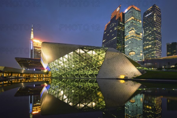GUANGZHOU, CHINA, APRIL 27, 2018: Guangzhou Opera House designed by famous Iraqi architect architect Zaha Hadid illluminated at night