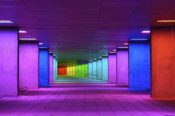 ROTTERDAM, NETHERLANDS, MAY 11, 2017: Colorful mulitcolored illuminated gallery tunnel rainbow passage installation under NAI building, Nederlands Architecture Institute near MuseumPark, Rotterdam