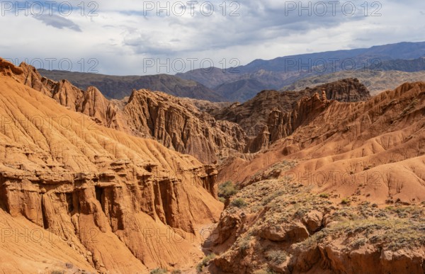 Eroded mountain landscape with sandstone cliffs, canyon with red and orange rock formations, Konorchek Canyon, Chuy, Kyrgyzstan, Asia