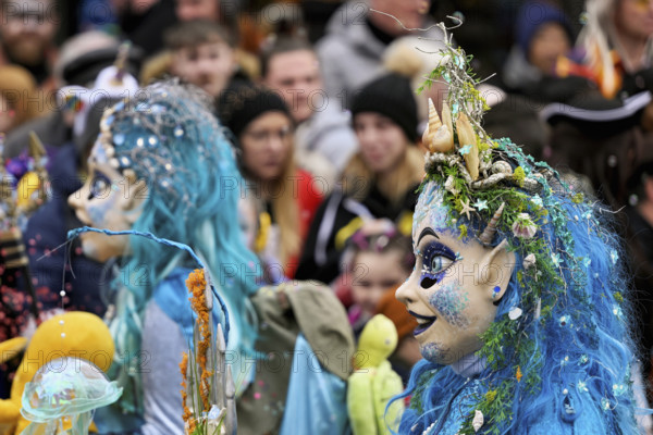 Person masked as Meerjugfrau at the carnival parade of the Wey guild on Rose Monday, Güdismäntig, Lucerne Carnival 2024, Lucerne, Switzerland, Europe