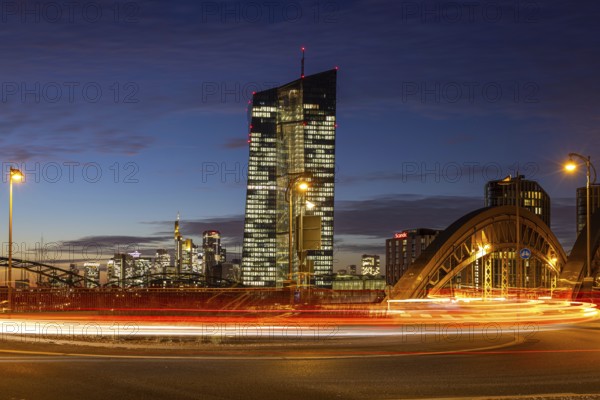 The lights in the offices of the European Central Bank (ECB) in Frankfurt am Main shine in the evening, Frankfurt am Main, Osthafen, Hesse, Germany, Europe