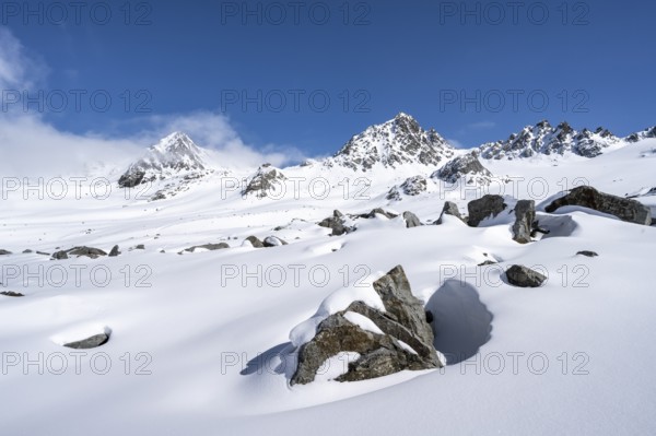 Picturesque snow-covered mountain landscape with peaks, ascent to the summit of Kesch Pitschen, Bündner Haute Route ski tour, Albula Alps, Rhaetian Alps, Grisons, Eastern Switzerland, Switzerland, Europe
