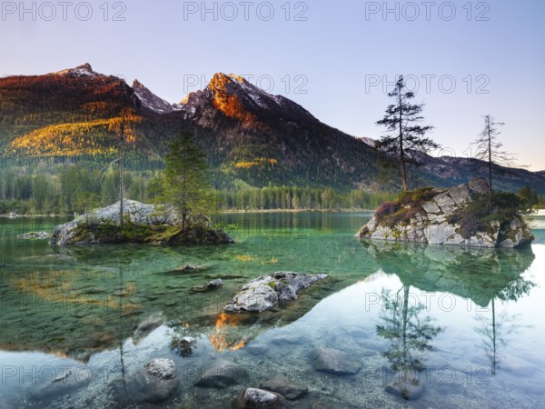 Hintersee in the morning, behind the peaks of the Hochkalter in the first sunlight, Berchtesgaden National Park, Ramsau, Berchtesgadener Land, Upper Bavaria, Bavaria, Germany, Europe