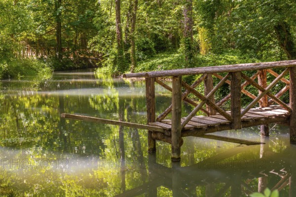Wooden bridges at the Lake of the Ducks in the Natural Park of the Monastery of Piedra, Aragon, Spain, Europe
