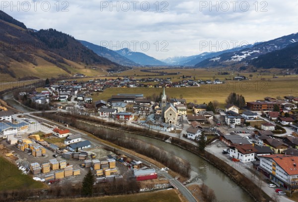 Drone image, residential buildings, view of village with parish church, Niedernsill, Salzach, Pinzgau, Salzburg province, Austria, Europe