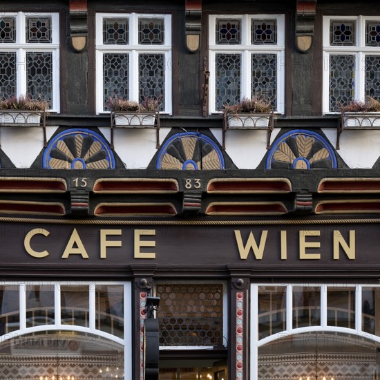 Half-timbered house from 1583, listed building, Cafe Wien, Old Town, Wernigerode, Harz, Saxony-Anhalt, Germany, Europe