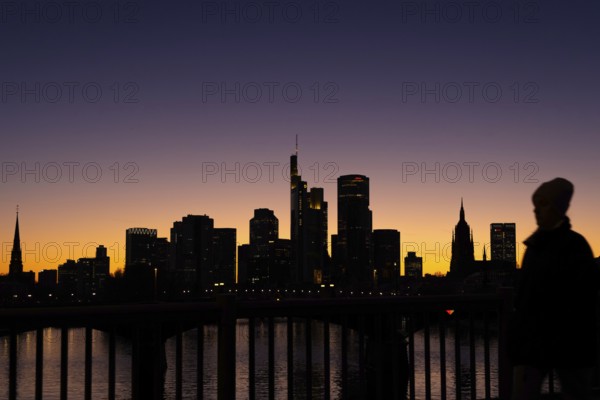 The silhouette of Frankfurt's banking skyline stands out in the evening against the residual light of the setting sun, Frankfurt am Main, Hesse, Germany, Europe