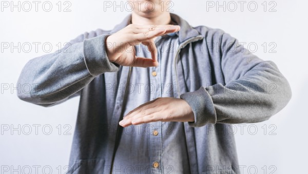 People talking in sign language isolated. Interpreter talking in sign language. Unrecognizable person gesturing in sign language