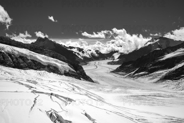 Snow mountains, the Swiss alps, Jungfrau Joch and glacier in black and white landscape. Grindelwald, Eiger, Switzerland, Europe