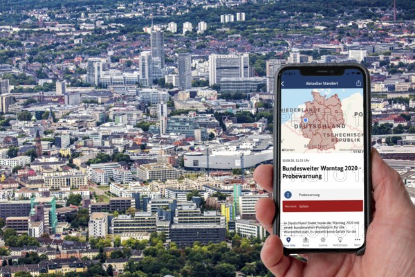Symbolic image for NINA Warnapp, the Federal Office of Civil Protection and Disaster Assistance, warns the user of various dangers, disasters, storms, Essen, Germany, Europe