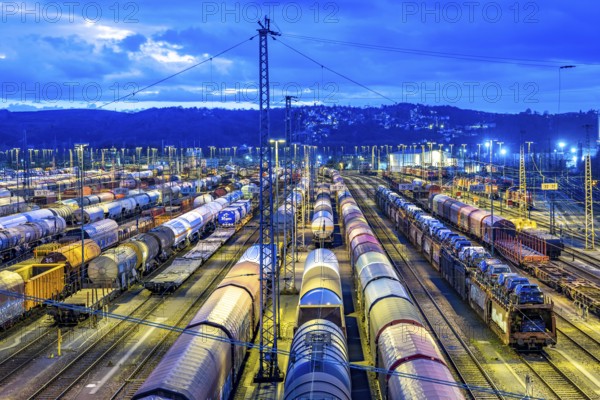The Hagen-Vorhalle marshalling yard, one of the 9 largest in Germany, is located on the Wuppertal-Dortmund railway line and has 40 directional tracks on which goods trains are assembled, in the evening, North Rhine-Westphalia, Germany, Europe