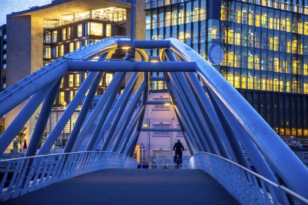 Amsterdam, Netherlands, bridge from the Nemo Science Museum to the city centre, St. Nicholas Basilica