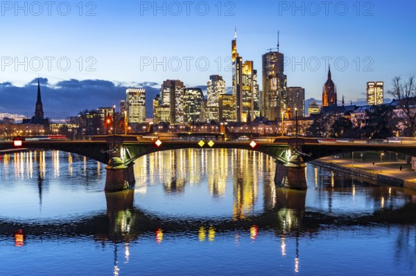 Skyline of the city centre of Frankfurt am Main, river Main, dusk, Ignatz-Bubis-Brücke, Hesse, Germany, Europe