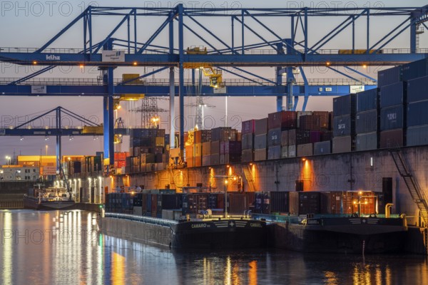 Port basin, gantry cranes in the Container Handling Centre, Trimodal Container Terminal, in the logport in Duisburg-Rheinhausen, cargo ship, Duisburg, North Rhine-Westphalia, Germany, Europe