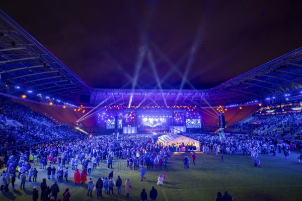 When over 25, 000 visitors flock to the Rudolf Harbig Stadium for the big Advent concert just in front of Christmas, the Christmas festivities begin for many Dresdeners. What began in 2015 as part of the celebrations to mark the anniversary of the world-famous Dresden Kreuzchor has now established itself as one of the biggest and most beautiful Christmas events in Germany., Dresden, Saxony, Germany, Europe